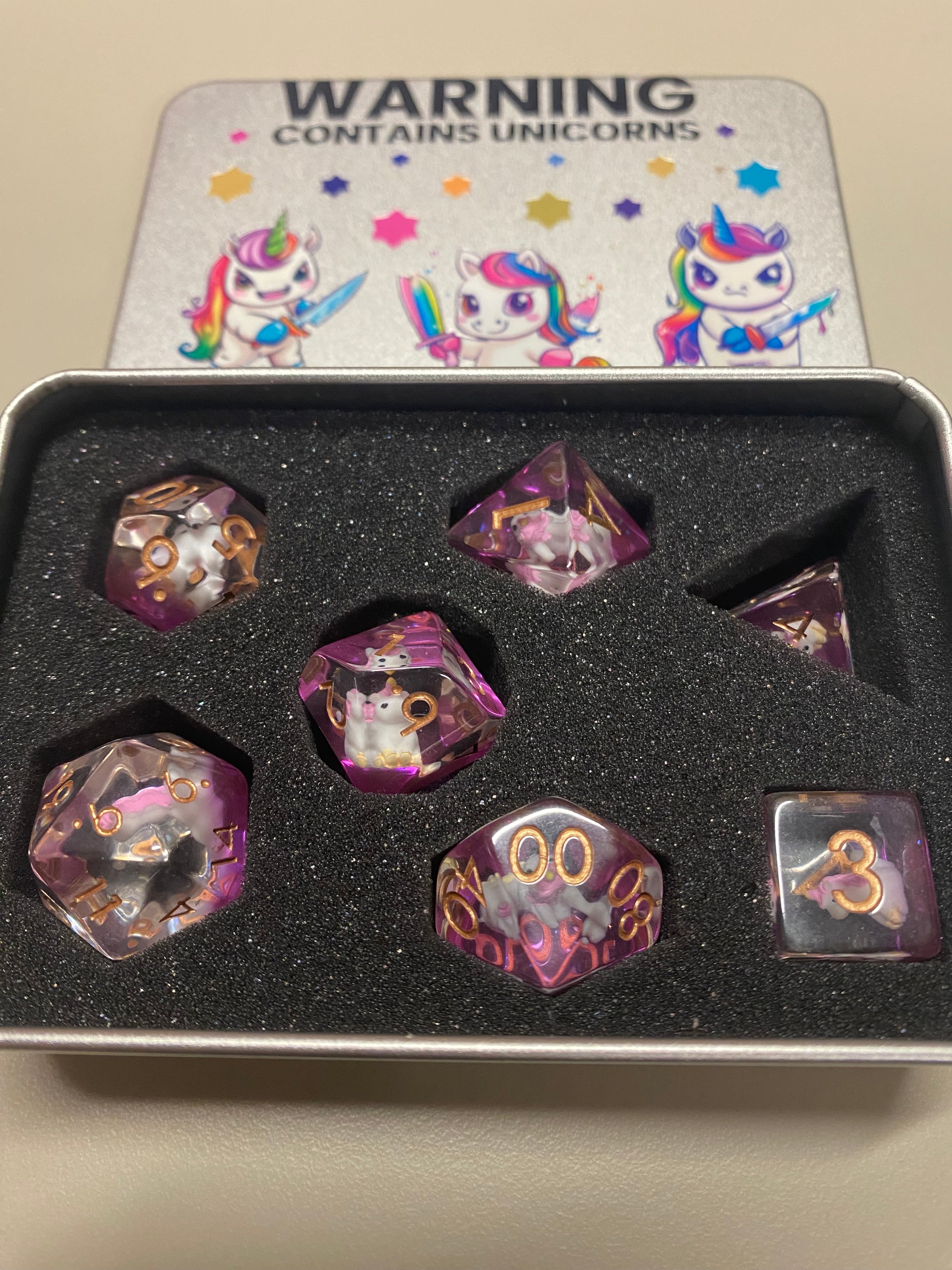 Role playing dice contains unicorns
